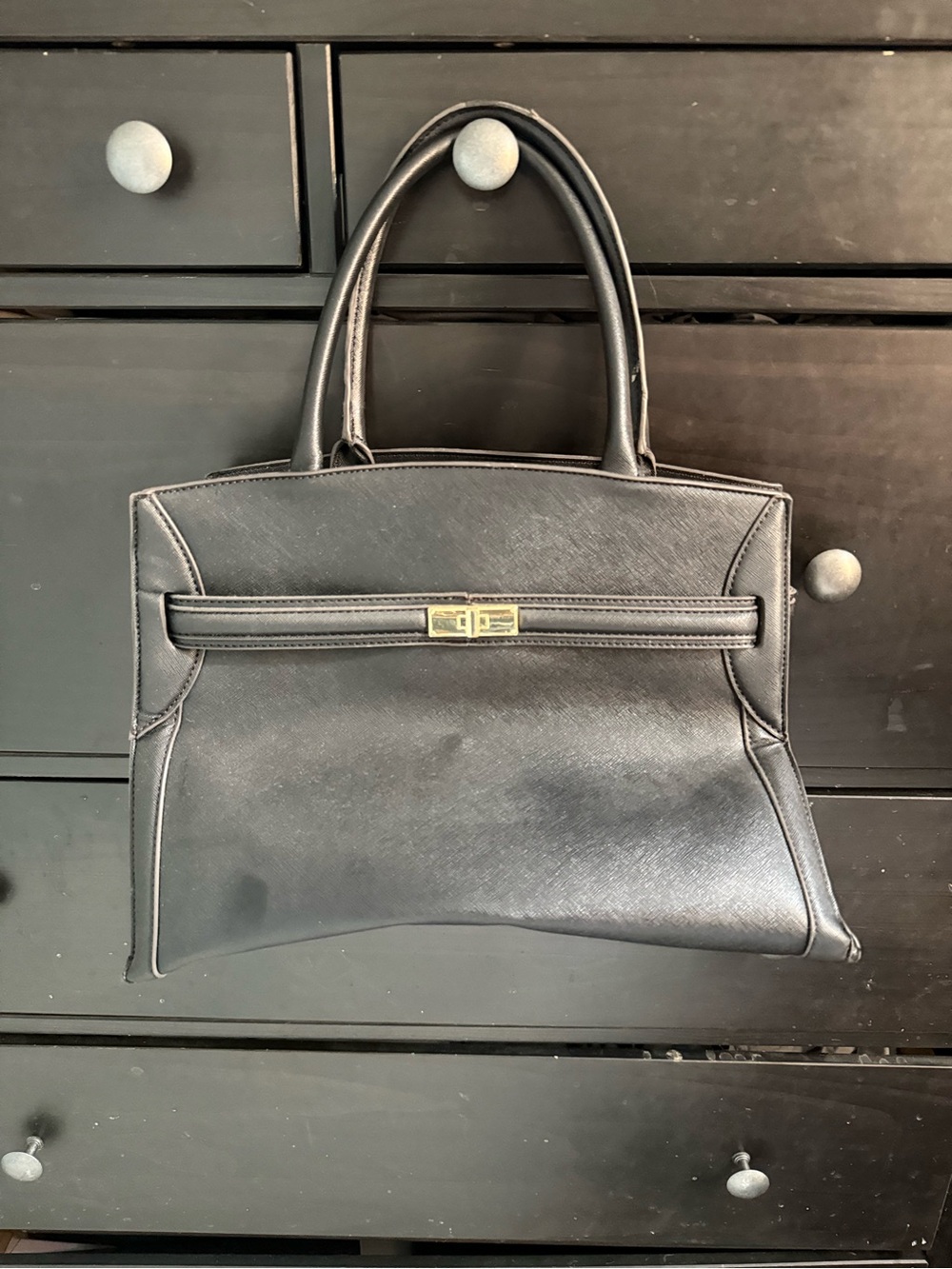 Classic Black Leather Handbag with Gold Accent